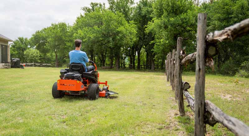 Man riding lawn mower